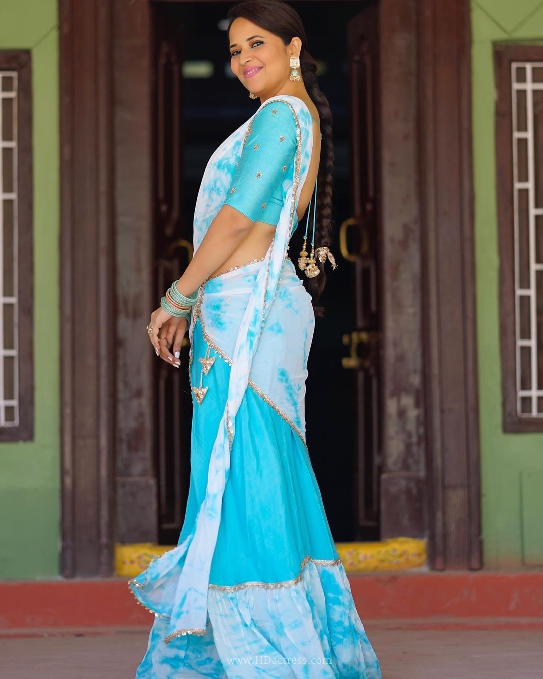 Anasuya Bharadwaj wearing sky blue white tie dye half saree Anasuya Bharadwaj wearing sky blue white tie dye half saree