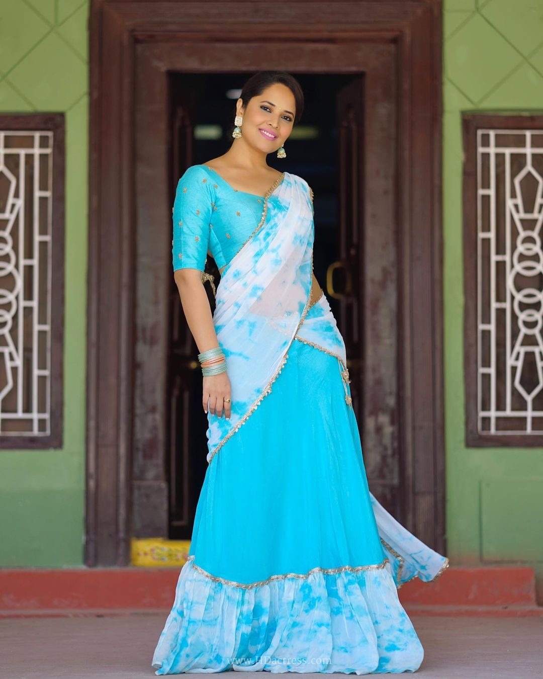 Anasuya Bharadwaj wearing sky blue white tie dye half saree Anasuya Bharadwaj wearing sky blue white tie dye half saree