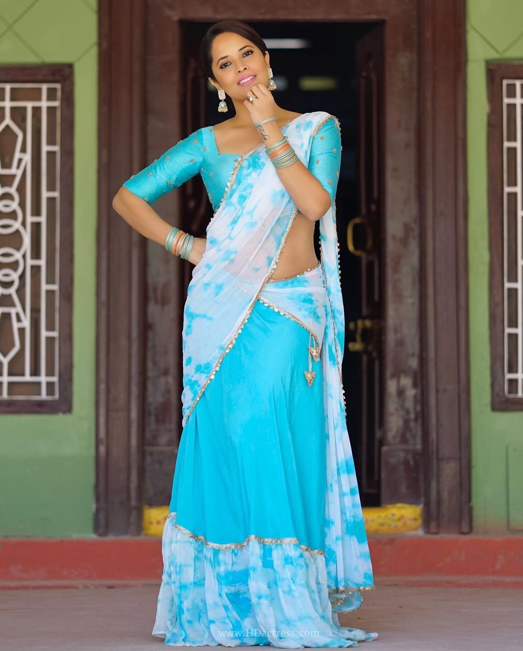 Anasuya Bharadwaj wearing sky blue white tie dye half saree Anasuya Bharadwaj wearing sky blue white tie dye half saree