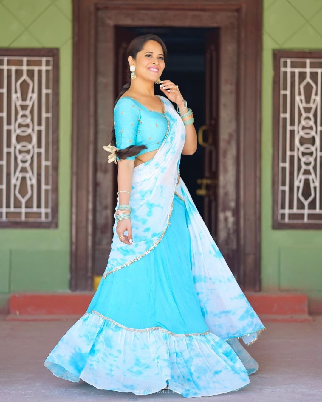 Anasuya Bharadwaj wearing sky blue white tie dye half saree Anasuya Bharadwaj wearing sky blue white tie dye half saree