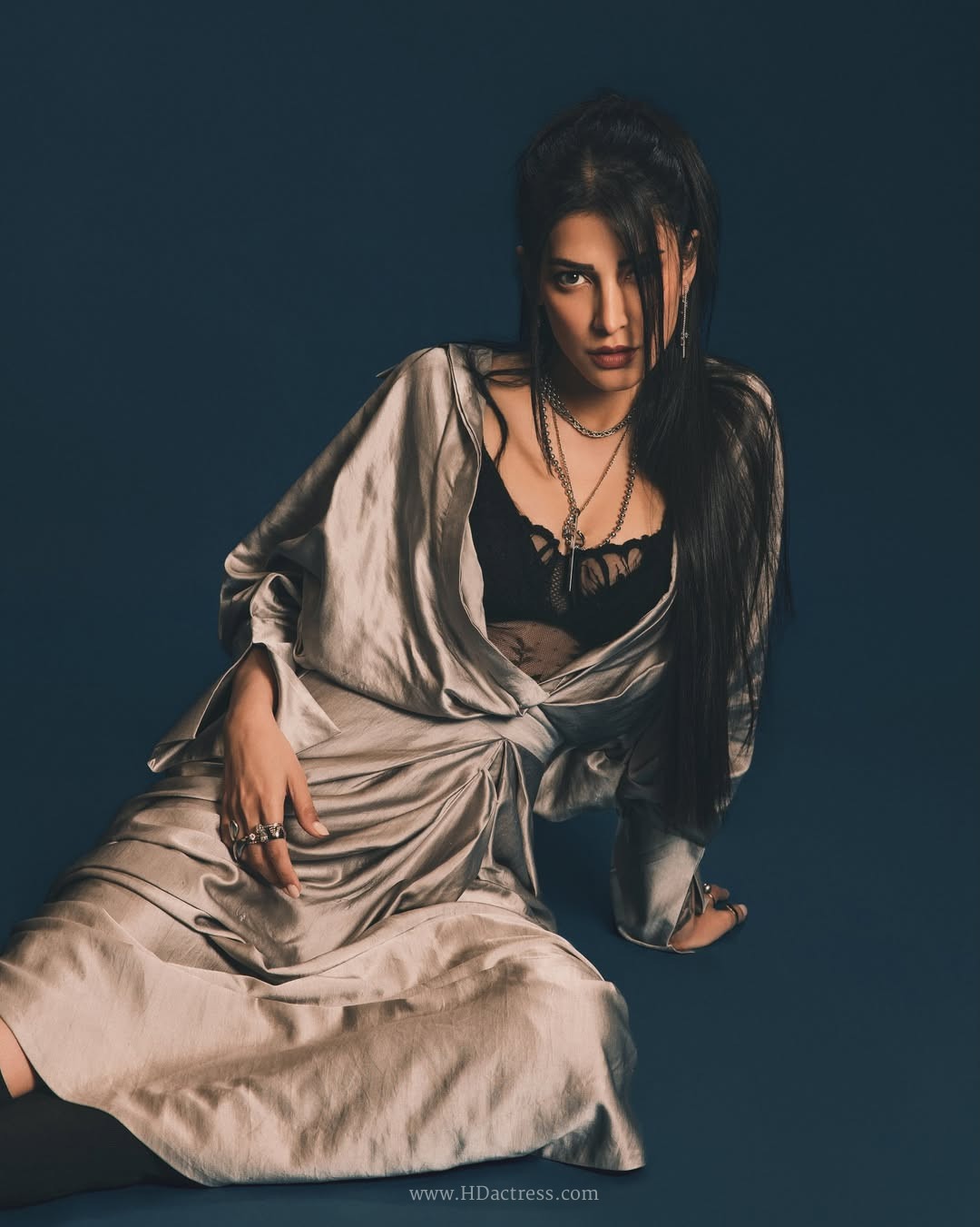 Shruti Haasan, black bralette under metallic fabric, full-length fashion photo