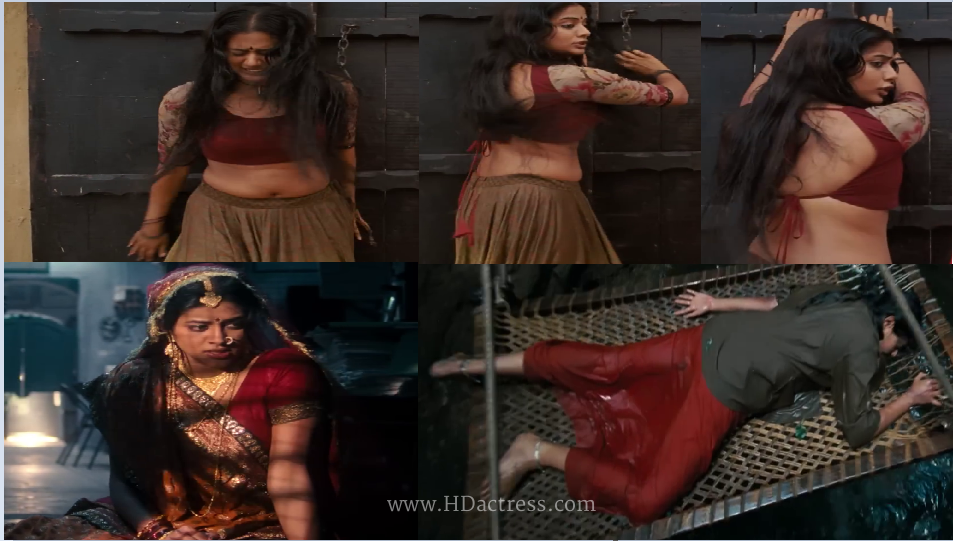 Priyamani hot navel in traditional saree, Priyamani sexy midriff close-up, Priyamani bold navel show in film still, Priyamani glamorous outfit highlighting curves, Priyamani dusky beauty posing with confidence