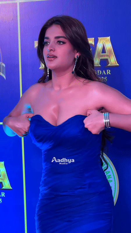 Nidhhi Agerwal Boldly Adjusts Cleavage at Event – Hot Photos That Broke the Internet
