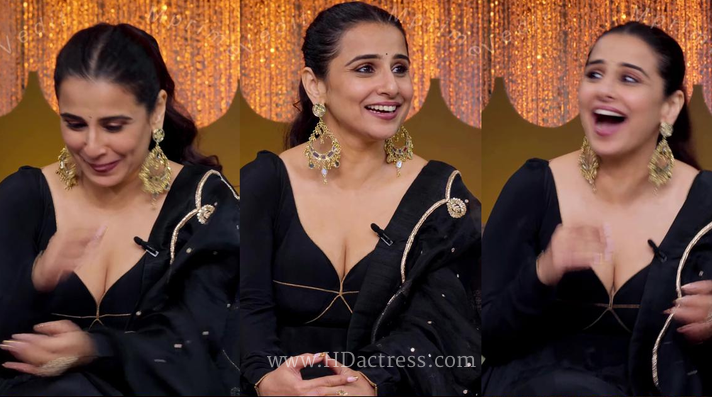Vidya Balan looking sexy in deep neck black dress showing cleavage