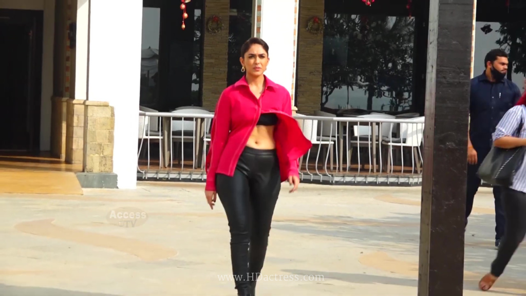 Busty Mrunal Thakur posing with accidental super hot navel exposure in deep neck outfit