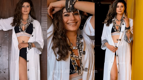 Pooja Batra body measurements 34-28-34, bra size 34B, height 5 feet 9 inches.