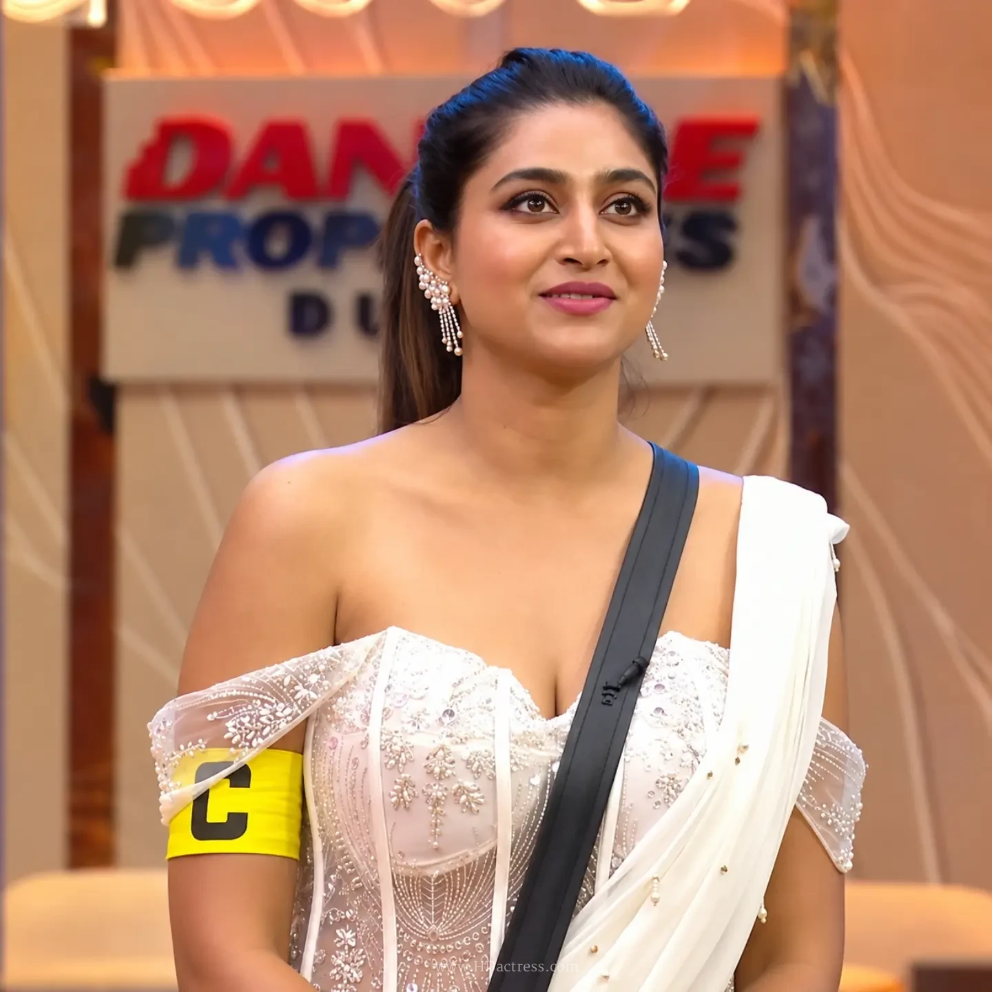 Varshini Sounderajan, Varshini Sounderajan Bigg Boss Telugu 10, white off-shoulder blouse, Bigg Boss Telugu 10 house photos, Varshini Sounderajan outfit, Telugu anchor Varshini, Bigg Boss Telugu 10 contestant