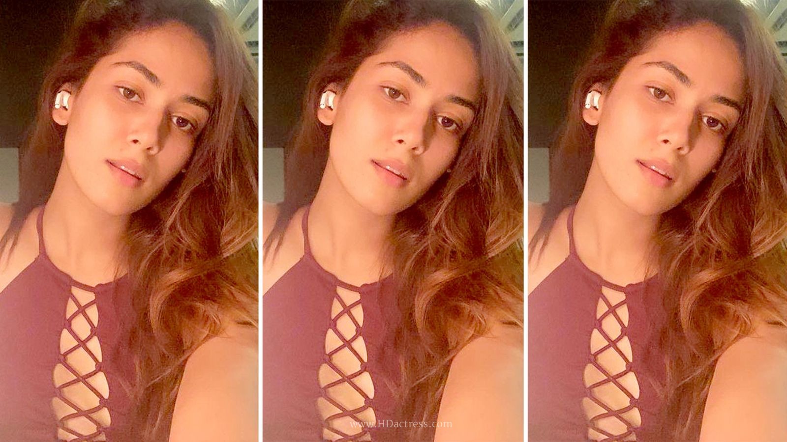 Mira Rajput Kapoor photos in a maroon high-neck sports bra with front lace-up detail and matching tights