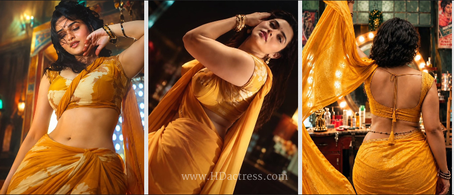 Kayadu Lohar body measurements 32-26-32, bra size 32B. That hourglass sits perfectly under the drape. The way the fabric moves with her body turns a classic saree into something you feel in your chest.