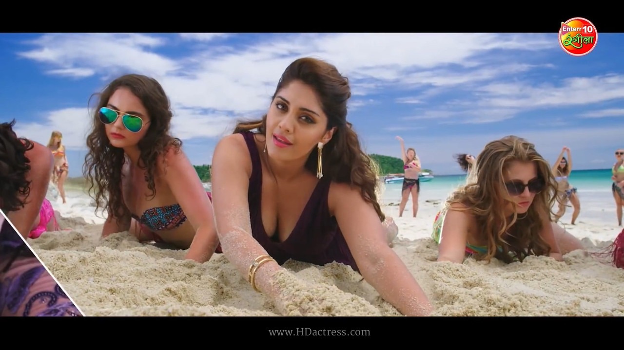 Surbhi Puranik side profile showing cleavage in purple sleeveless gown